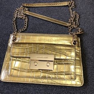Mk cross body gold  chain